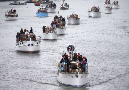 Boats muster on the River Thames, in celebration of the Queen's Diamond Jubilee, in London