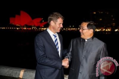 Smiling Mike Baird converts Sydney to chinese