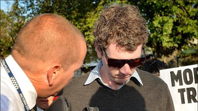 Police issue Anthony Main with a court summons