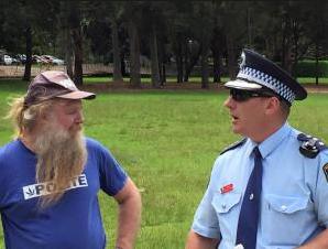 Police questioning a Greens voter
