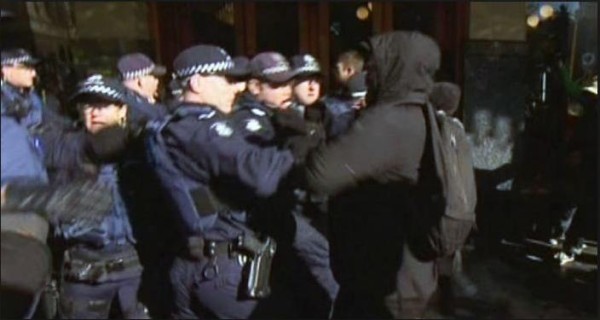 Victoria Police attacked by masked protesters